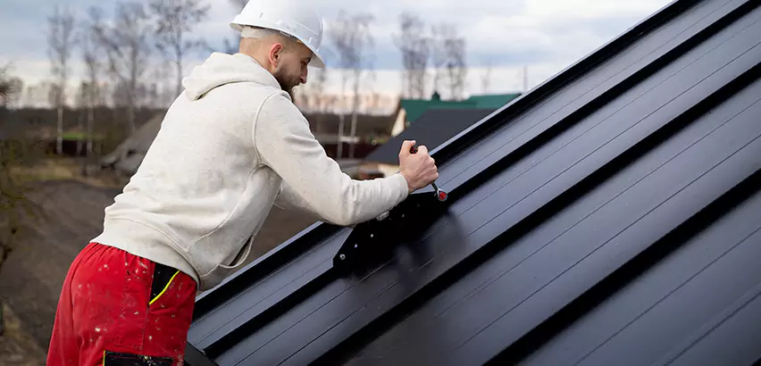 Tin Roof Ridge Cap Installation in Puyallup